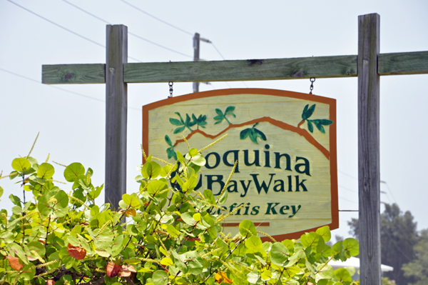 sign: Coquina Bay Walk Leffis Key